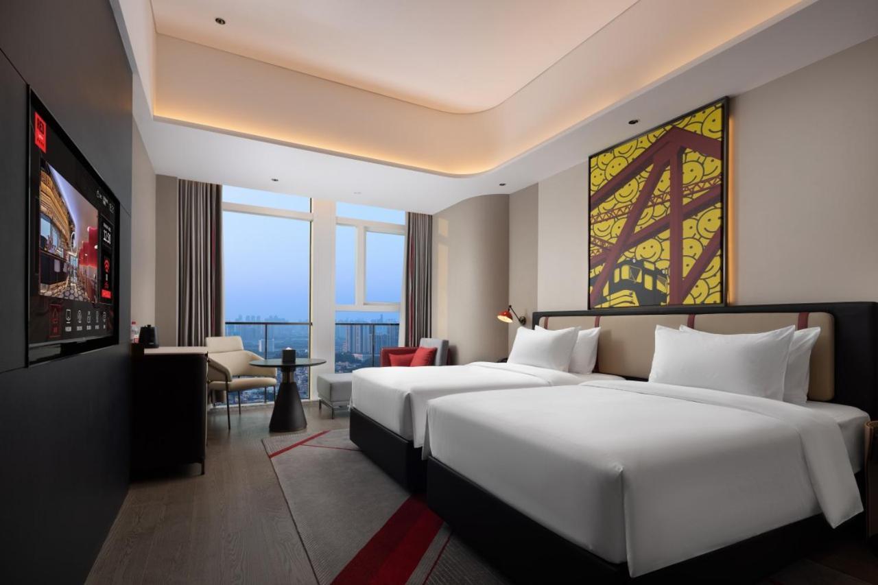 Radisson Red Guangzhou South Railway Station Otel Oda fotoğraf